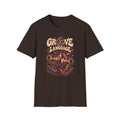 Dark brown Groove Is a Language T-shirt with two musicians in a cosmic jam with planets and waves.