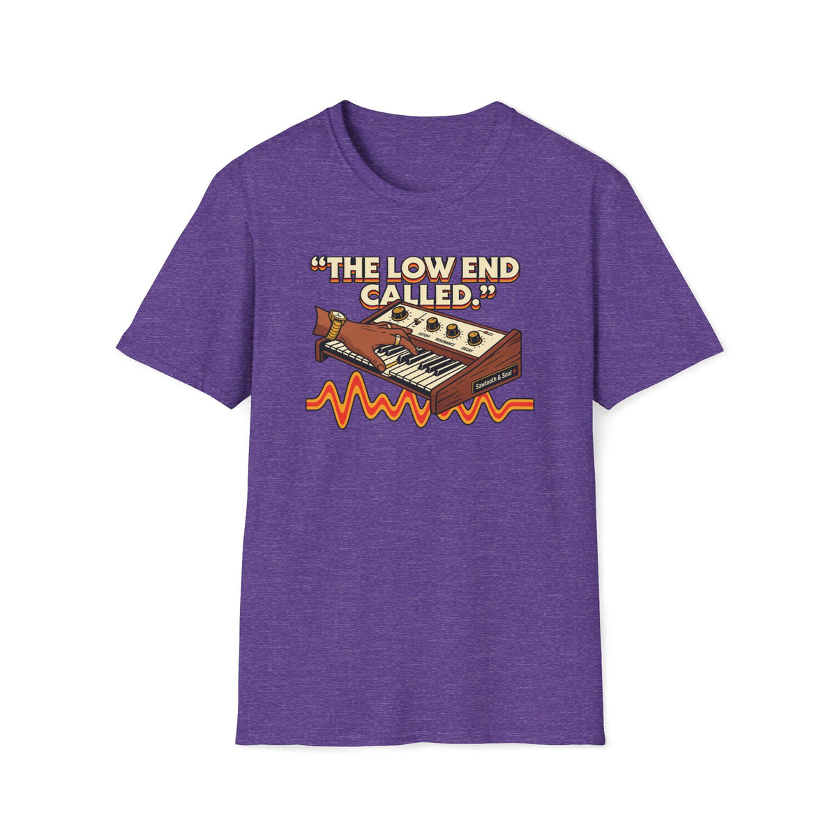Heather Purple “The Low End Called” T-shirt featuring a hand playing a retro synthesizer, cream lettering, and an orange-and-gold waveform.