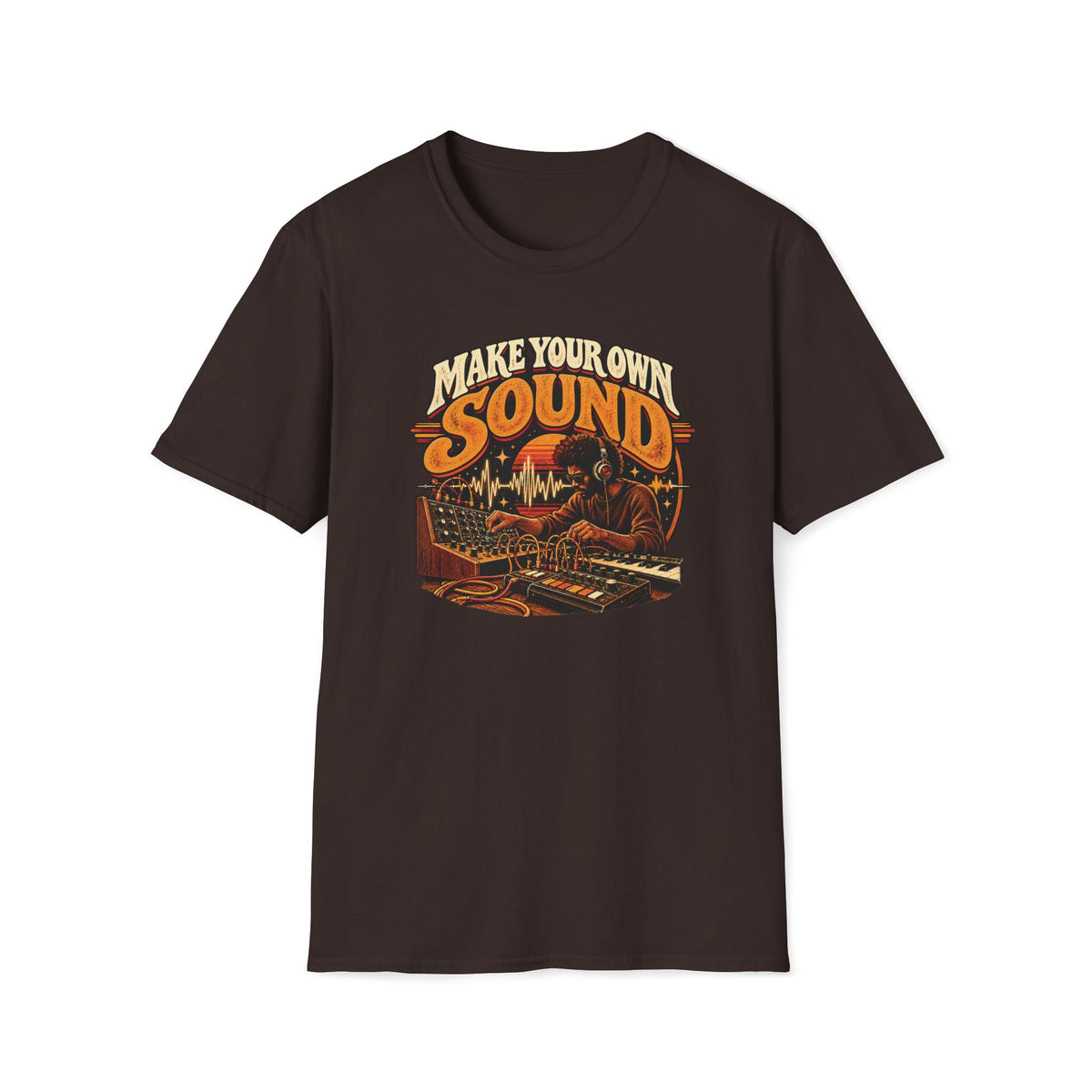Dark brown Make Your Own Sound T-shirt with a musician working with synthesizers and patch cables.