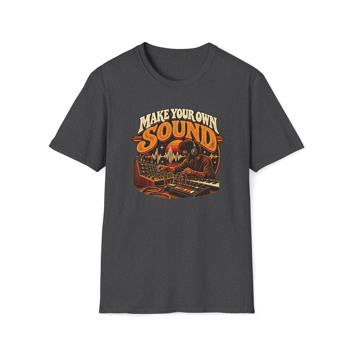 Dark heather gray Make Your Own Sound T-shirt with a musician working with synthesizers and patch cables.