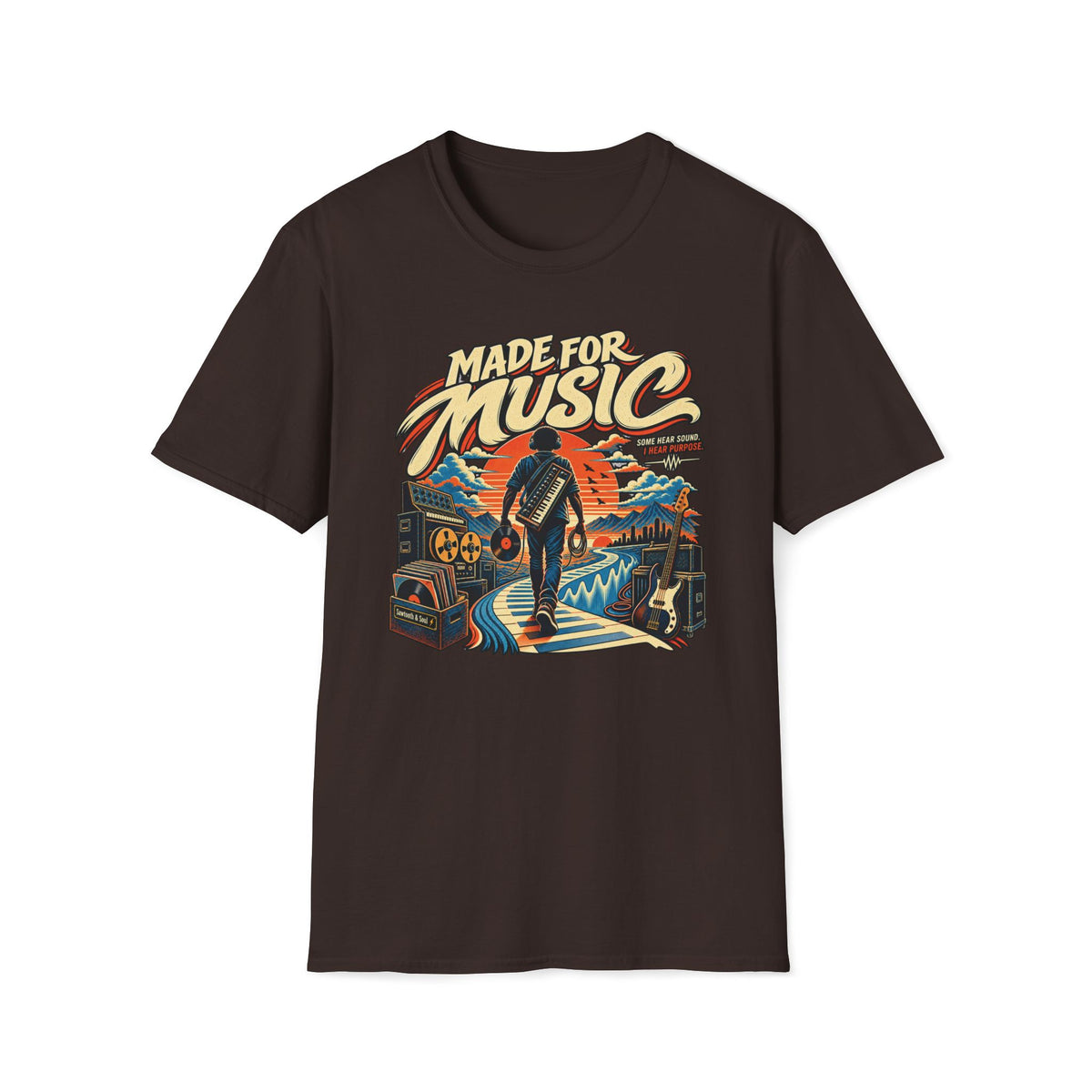 Dark brown Made for Music T-shirt with a musician following a piano-key path toward a sunset.