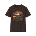 Dark brown Signal to Soul Ratio T-shirt with vintage meters, a cosmic portrait, and waveforms.