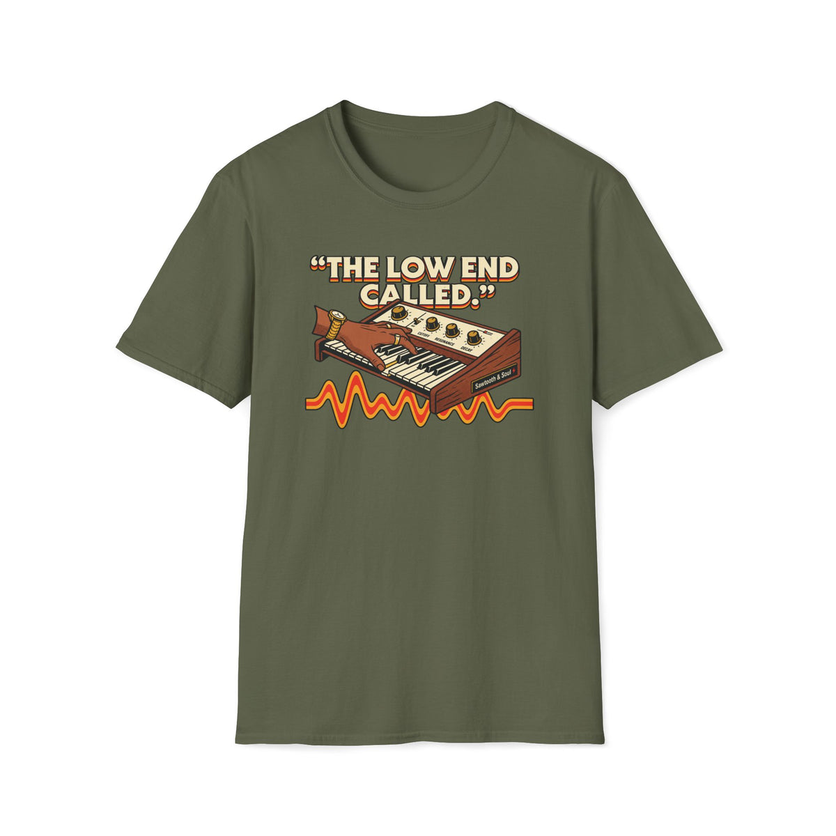 Military Green “The Low End Called” T-shirt featuring a hand playing a retro synthesizer, cream lettering, and an orange-and-gold waveform.