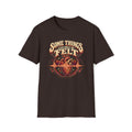 Dark brown Some Things Can Only Be Felt T-shirt with an anatomical heart crossed by an audio waveform.