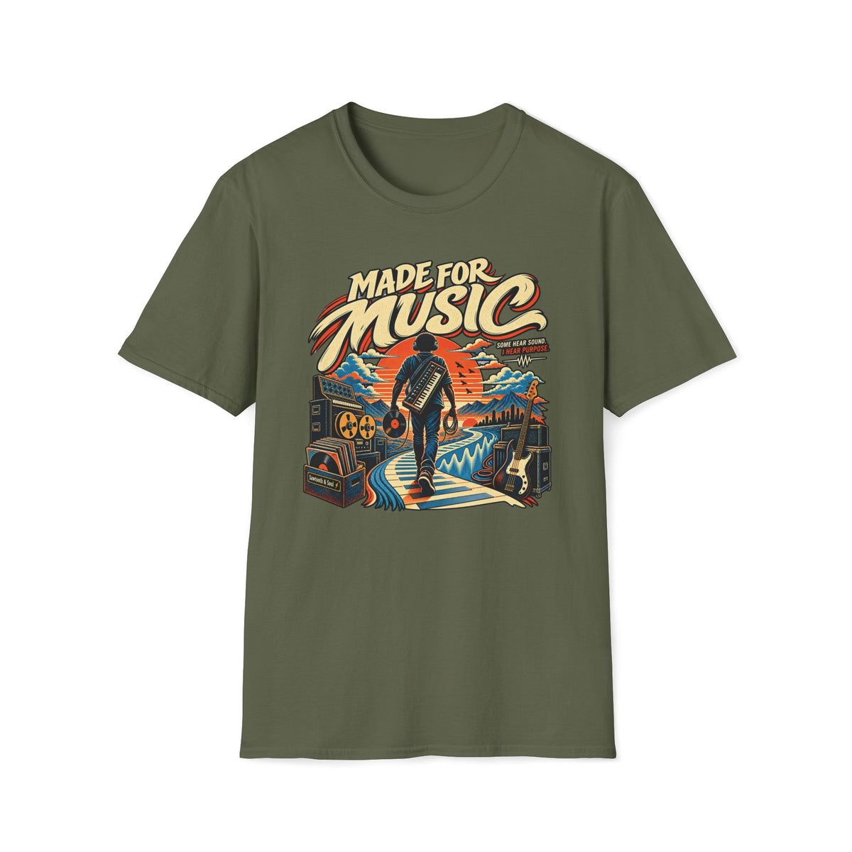 Military green Made for Music T-shirt with a musician following a piano-key path toward a sunset.